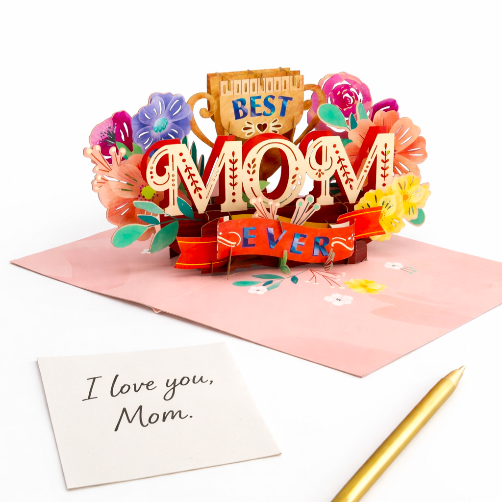 Colorful 3D pop-up card for Mother's Day with flowers and 'Best Mom Ever' text on a white background.