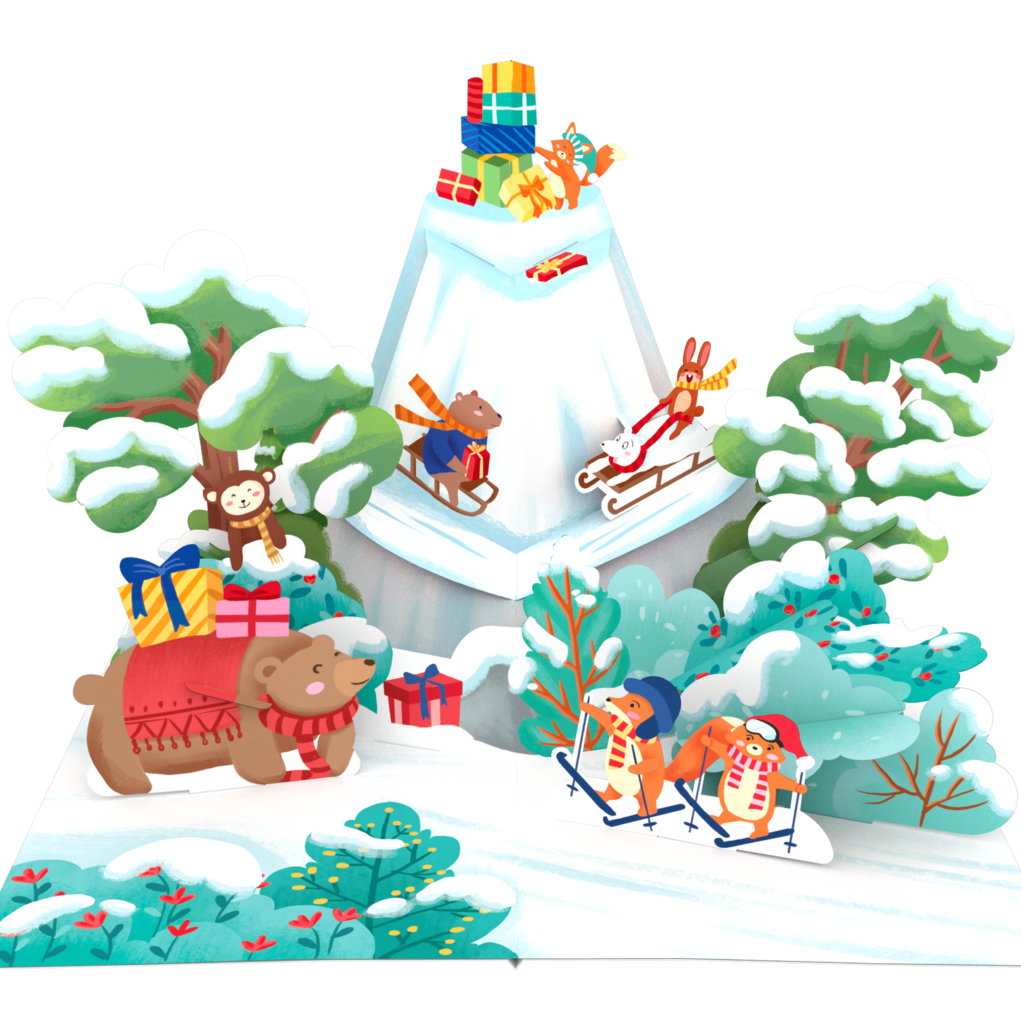 A 3D papercraft pop-up display featuring a winter Christmas scene with a snow-covered mountain, sleighs, a bear pulling a sled, a monkey riding a sled, and gift boxes, all set against a plain white background.