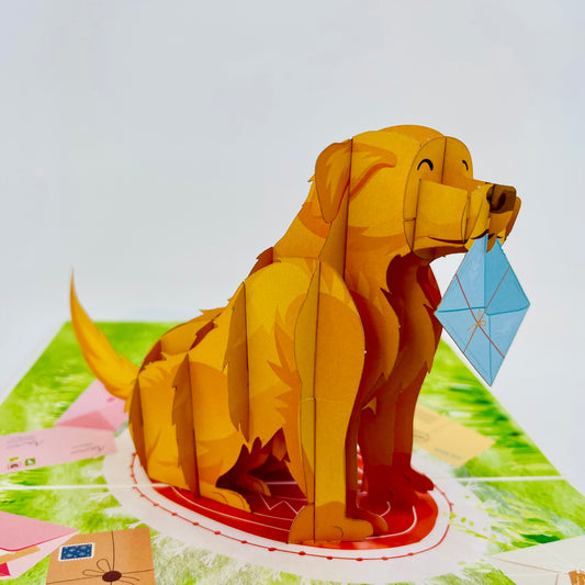 A three-dimensional greeting card depicting a yellow dog with a letter in its mouth, set against a colorful background.