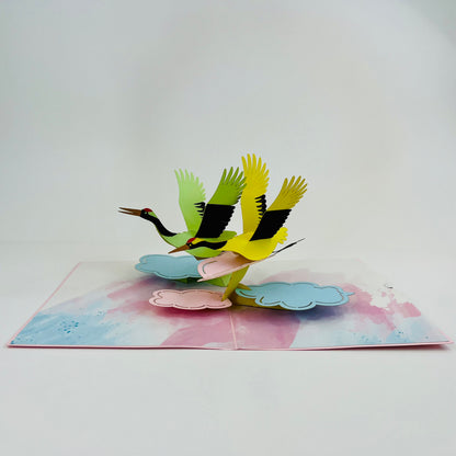 3D pop-up card with cranes on a watercolor background