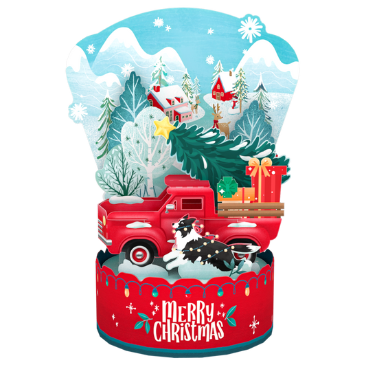 Christmas-themed card with a red truck, dog, and snowy landscape